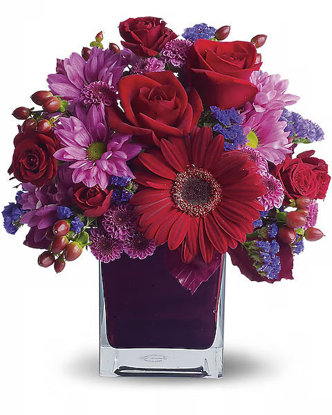 Red roses and assorted flowers